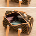 Vintage style shoulder strap handbag